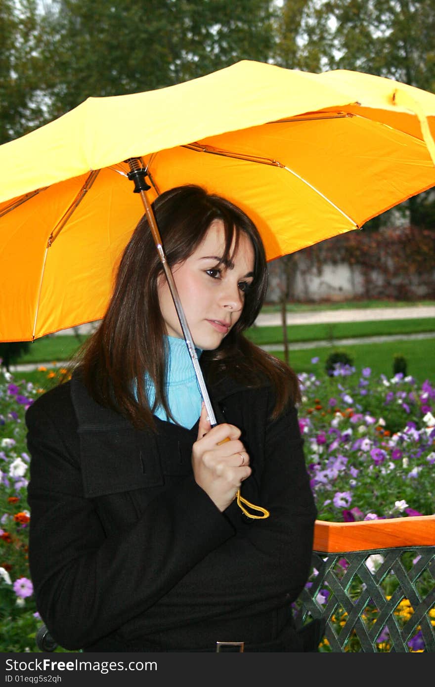 Beautiful woman holding a umbrella