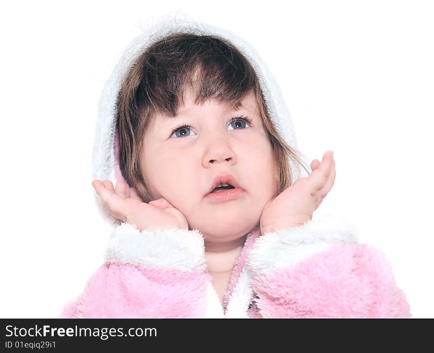 baby girl in pink bathrobe after taking a bath