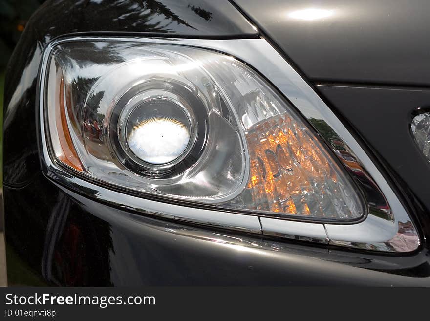 Headlight from car close-up