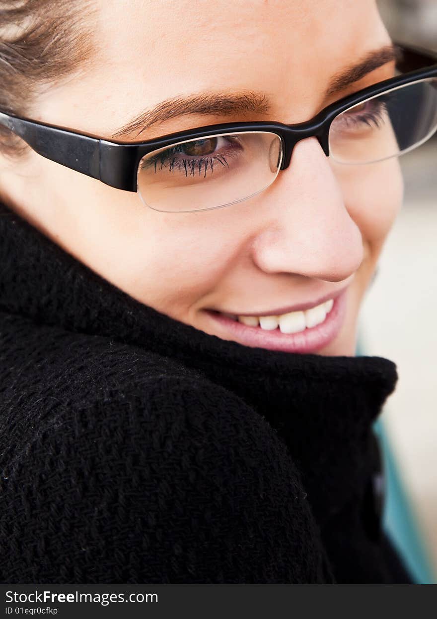 Young woman close portrait using glasses. Young woman close portrait using glasses