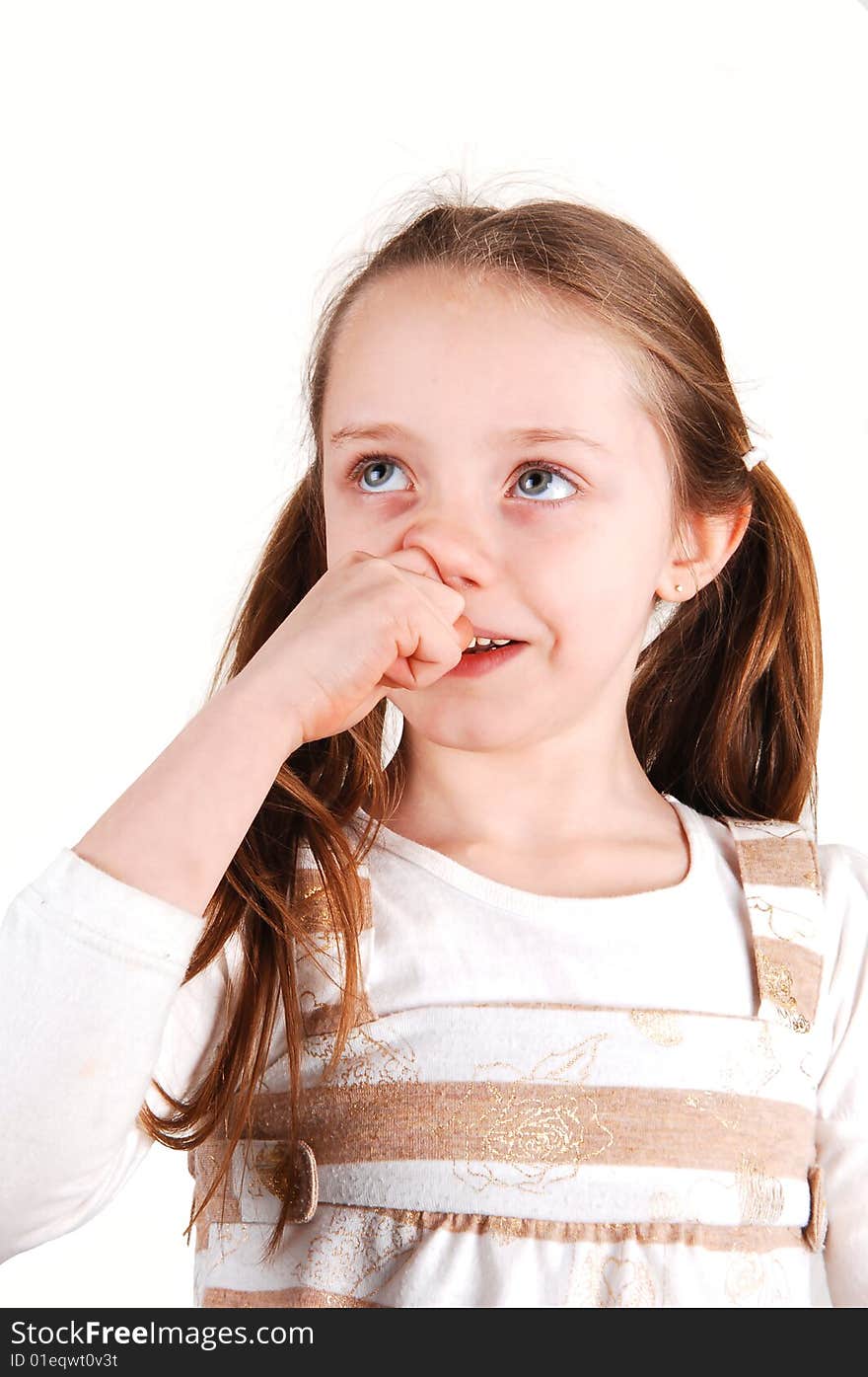 Girl with finger in nose.