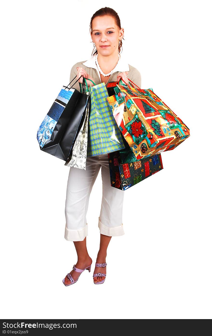 A young woman back from an shopping spree is happy that she got
what she was looking for. A young woman back from an shopping spree is happy that she got
what she was looking for.