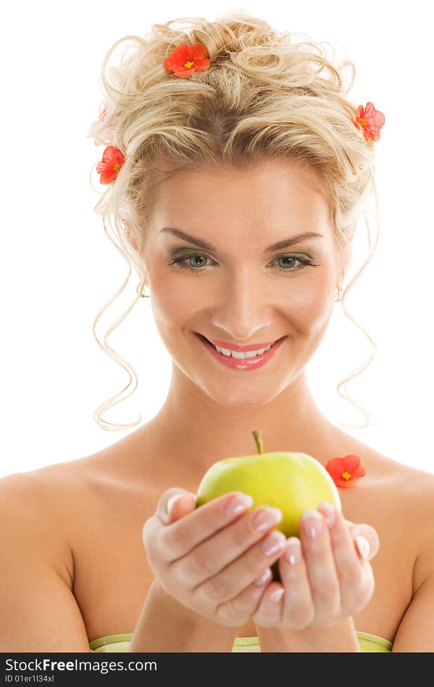 Beautiful young woman with ripe green apple. Spring concept