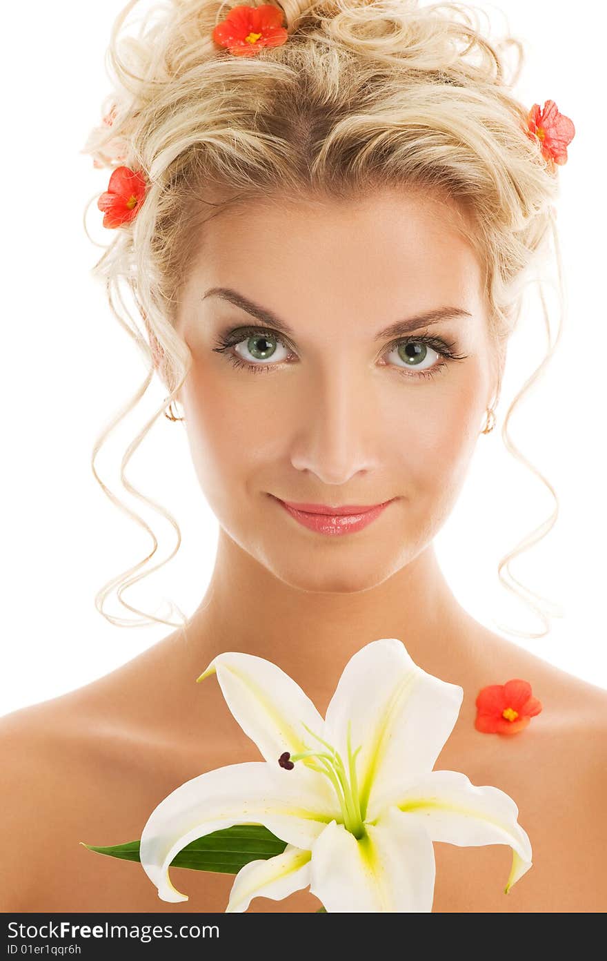 Beautiful young woman with lily flower