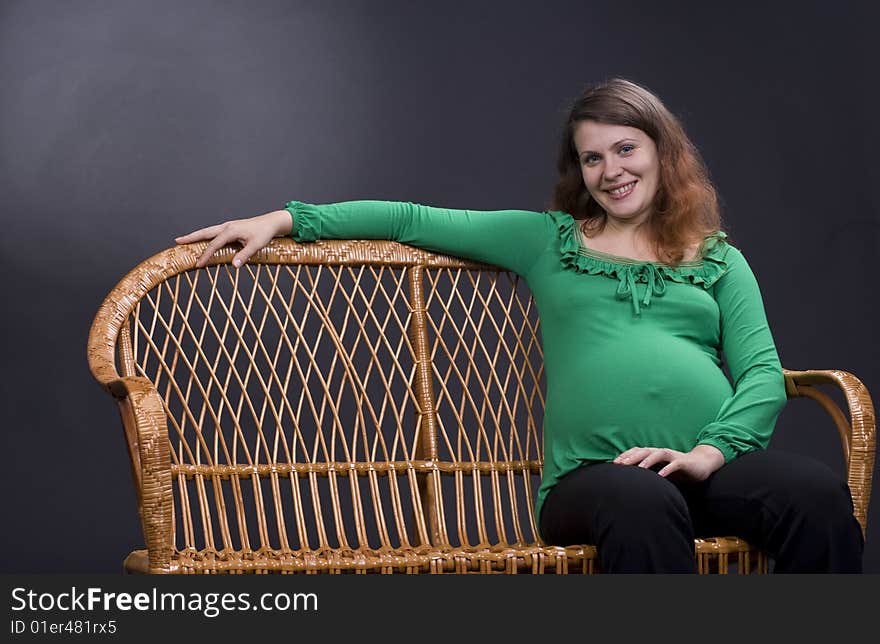 Beautiful pregnant woman is smiling for you. Beautiful pregnant woman is smiling for you