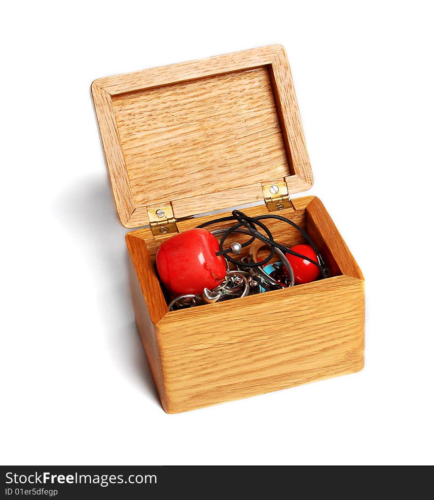 Small chest with bijouterie isolated over white