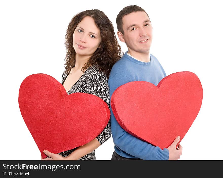 Loving couple holding hearts isolated over white background