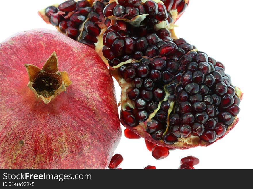 Pomegranate on a white background. Pomegranate on a white background.