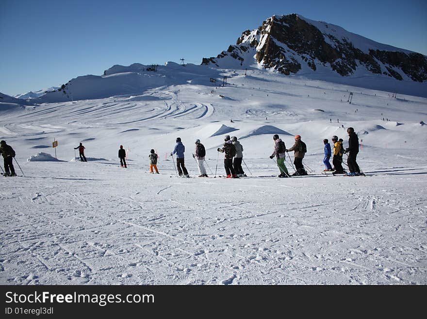 Austria. Mountains. The Alpes.Skiers on a mountain slope.