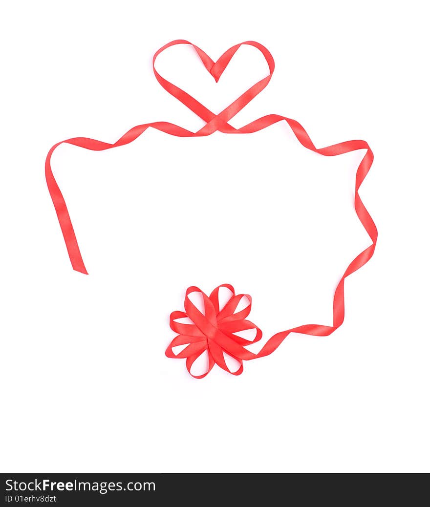 Red heart from ribbon for valentine isolated over white