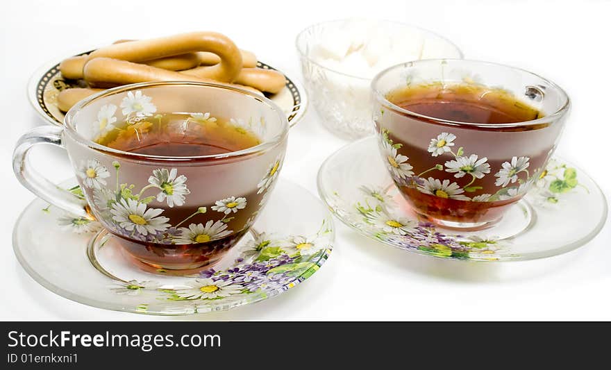 Two Tea Cups On A Saucer