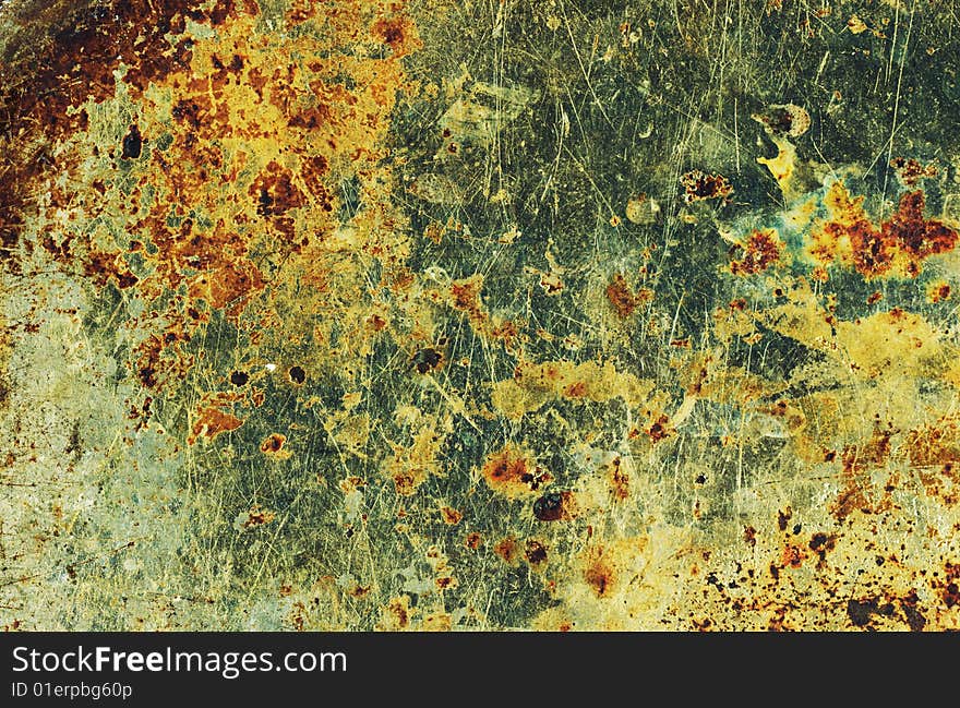 Old rusty background with traces of an oil.