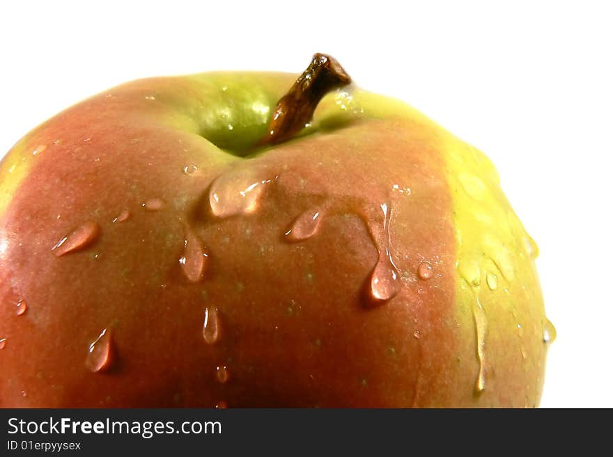 Close up of red apple with water drops