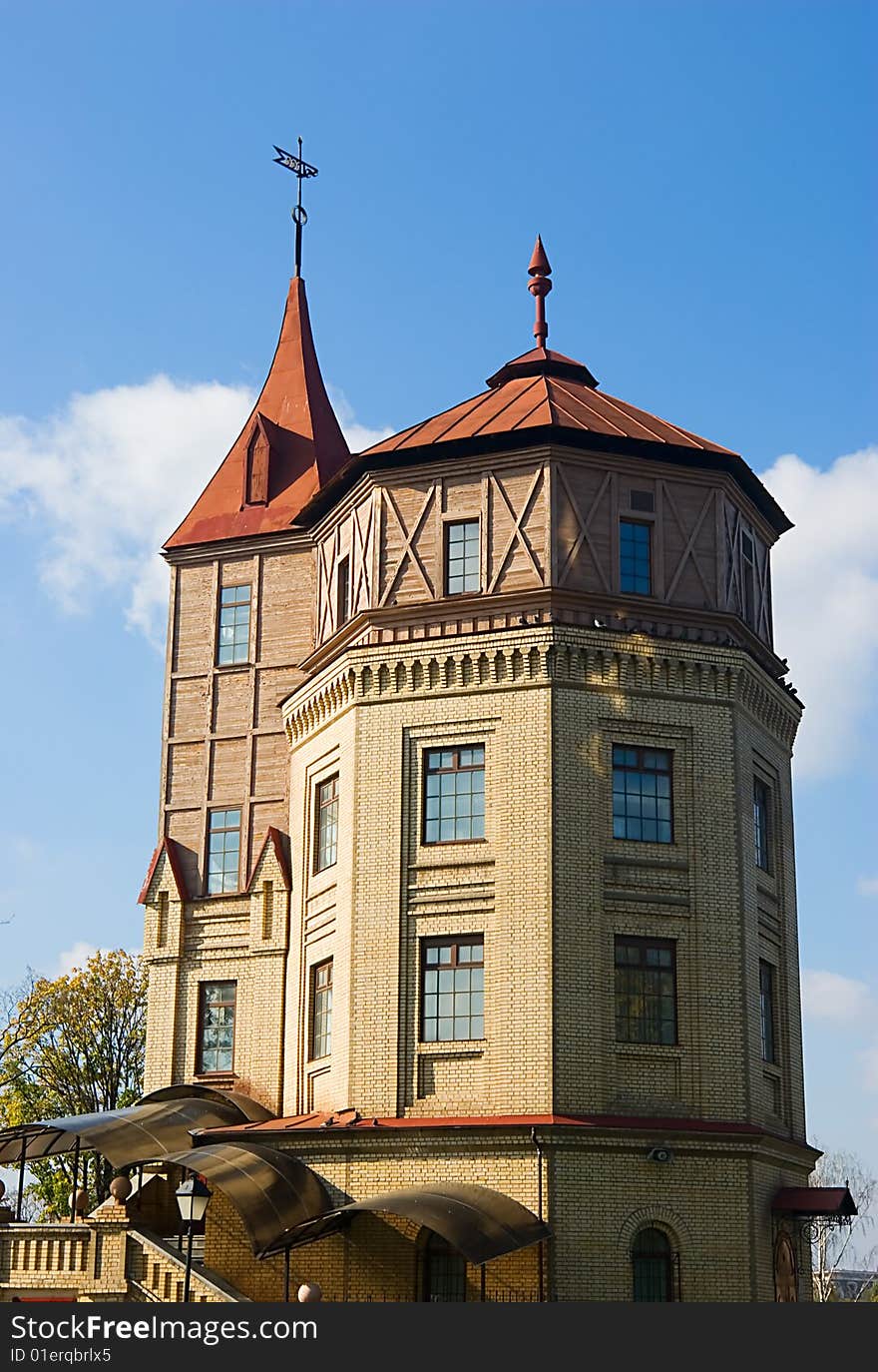 Brick building with a wooden tower