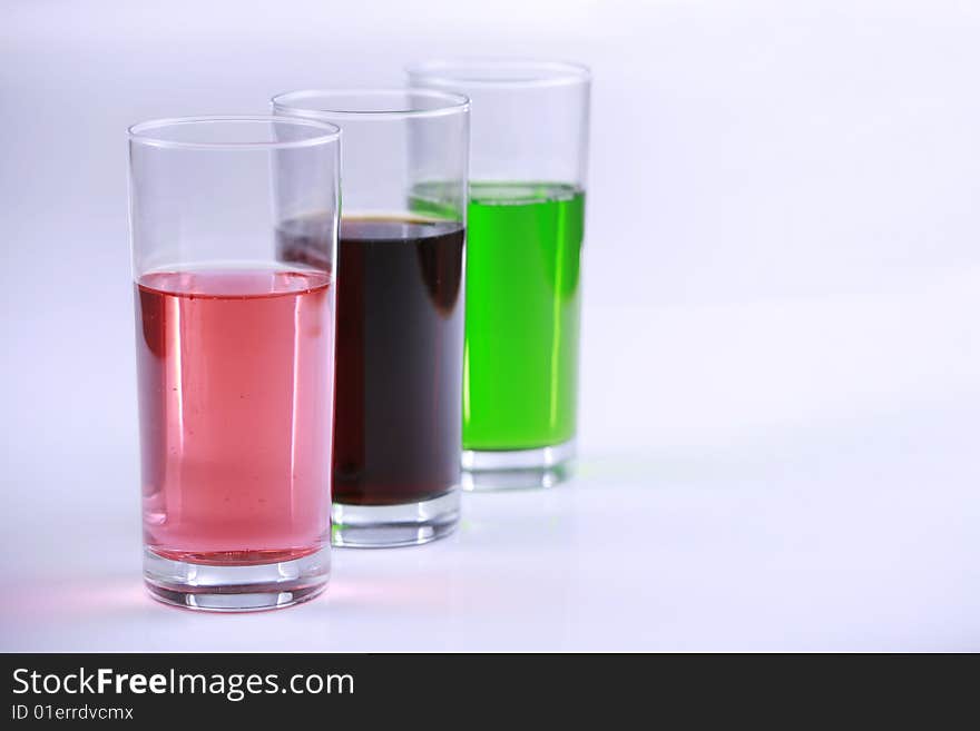 Three Glasses With Colorful Drinks