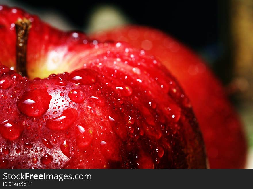 Water drops on a red apple