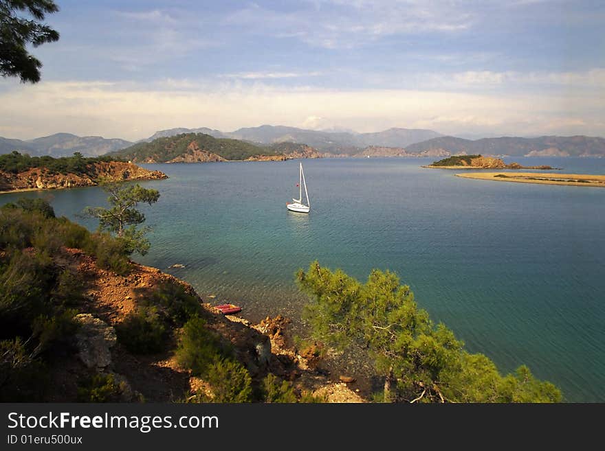 Anchored Yacht At Beautiful Coast