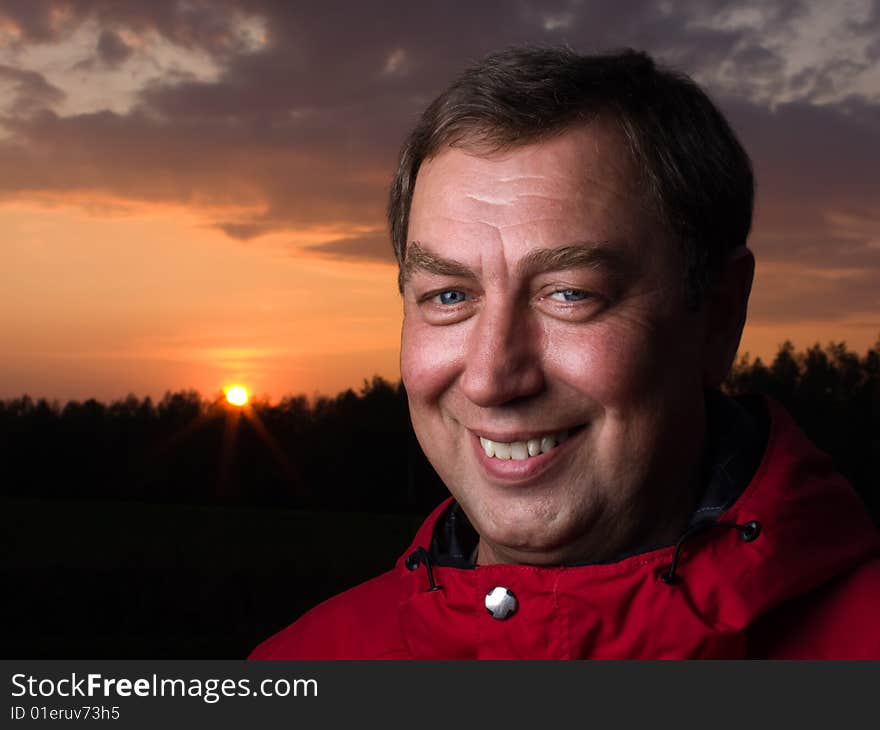 Portrait of a man outdoors against the sun