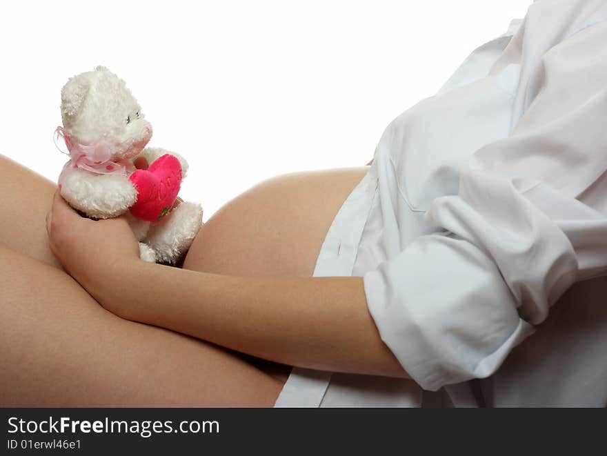 Pregnant woman with toy