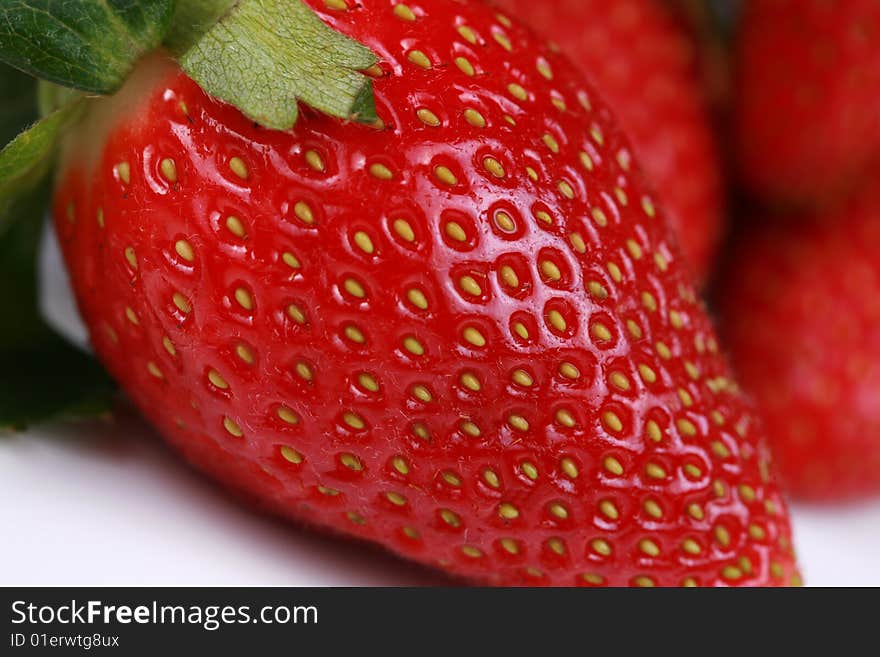 One delicious red strawberry isolated. One delicious red strawberry isolated