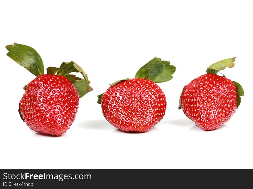 Three red strawberries