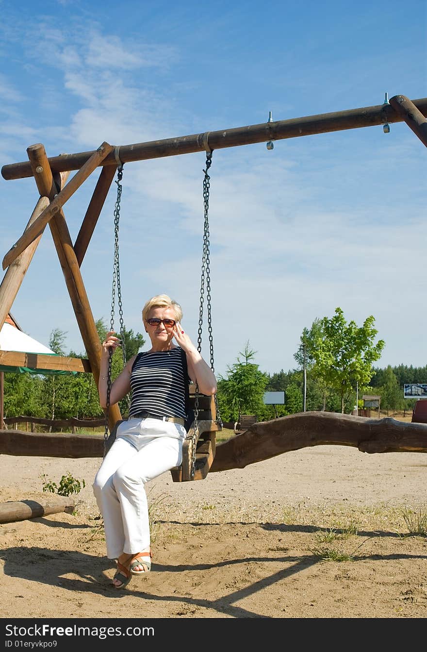 Woman On The Swing