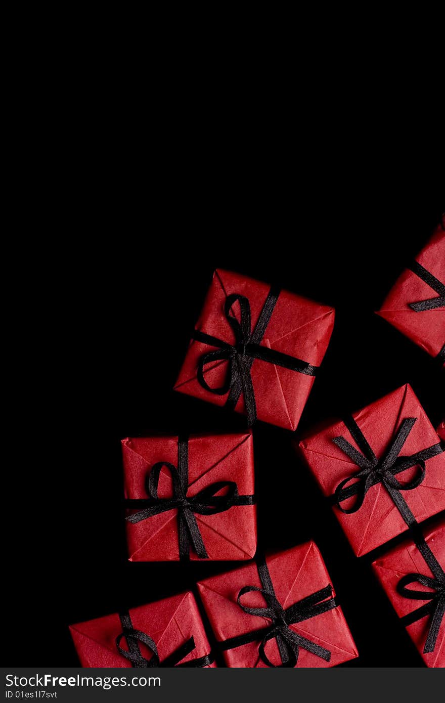 Many red gift boxes on black background