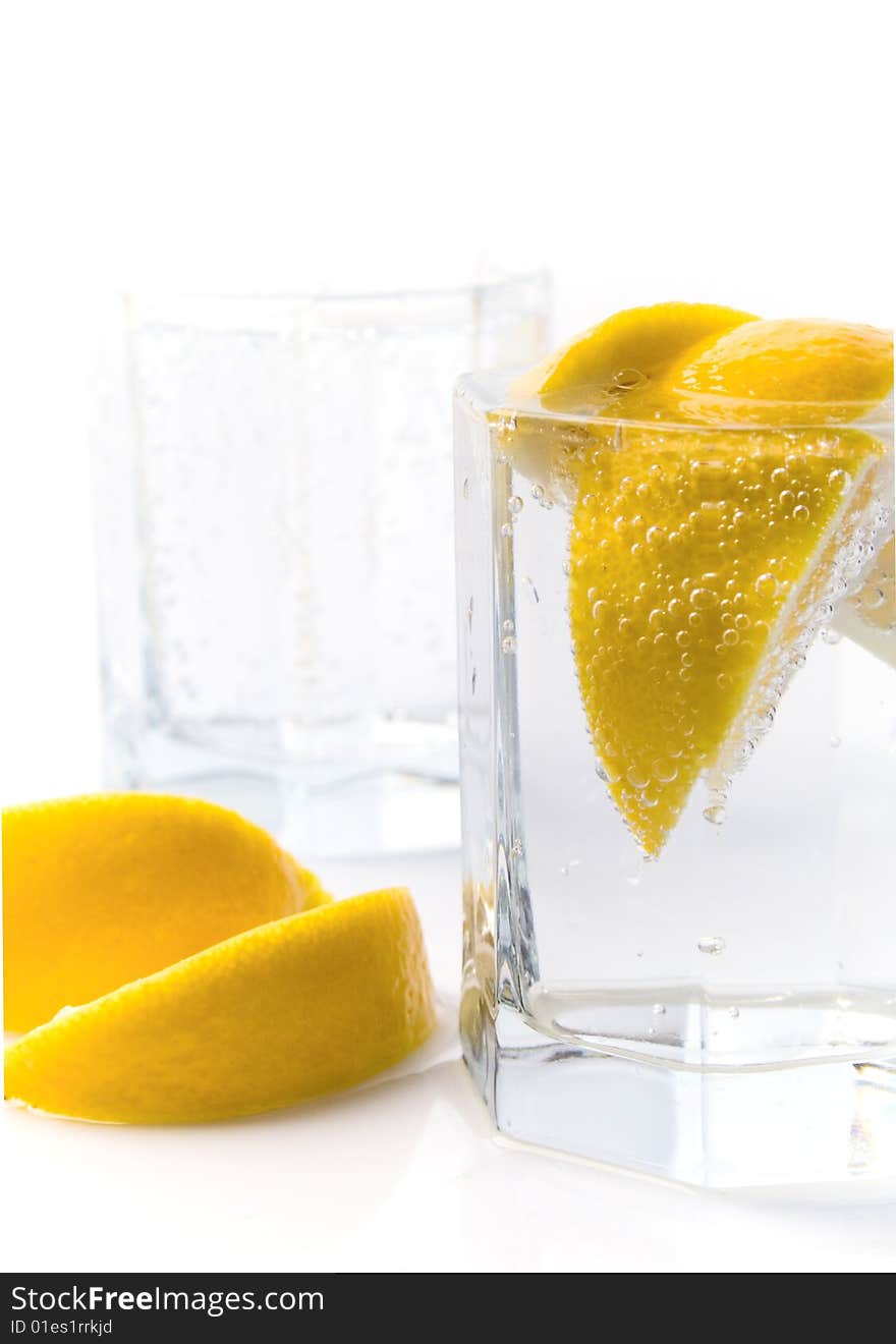 Soda water and lemon slices