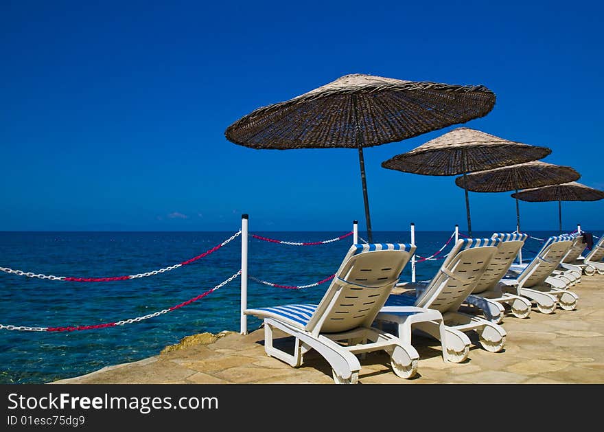 Sunshades in Turkish resort in the Aegean sea