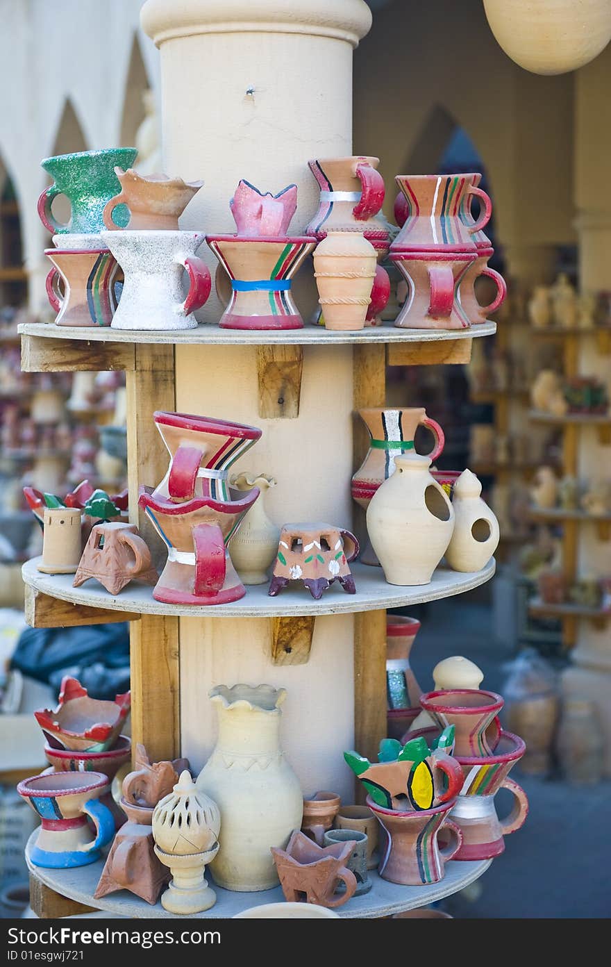 A traditional Arabian market in Nizwa, Oman, with clay or ceramic water pots and incense burners from the renowned village of Bahla. A traditional Arabian market in Nizwa, Oman, with clay or ceramic water pots and incense burners from the renowned village of Bahla.