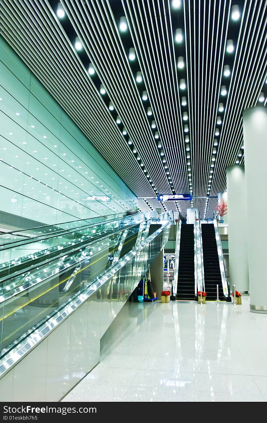 Escalators in modern hall of T3 airfield beijing.