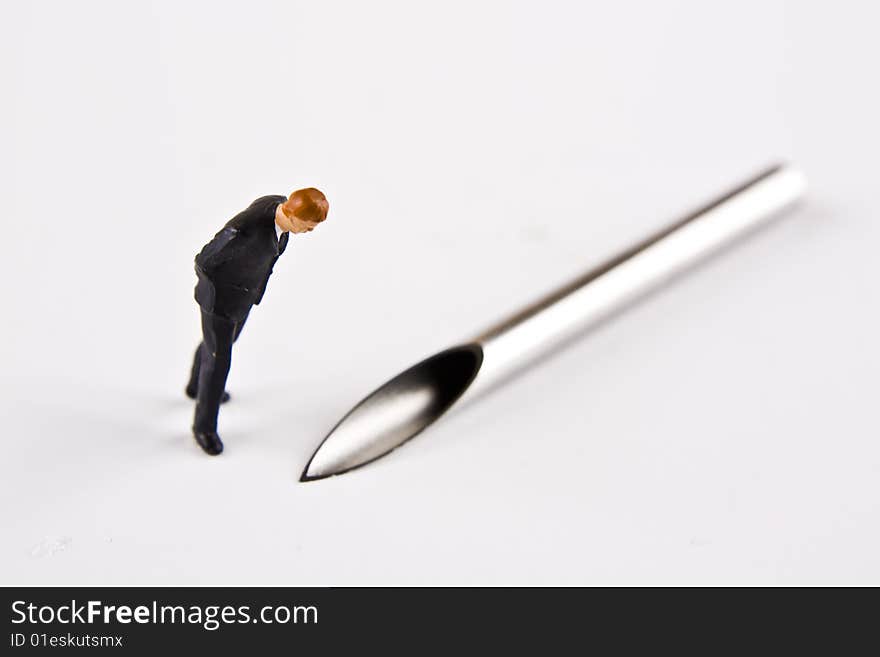 Businessman and Piercing needle