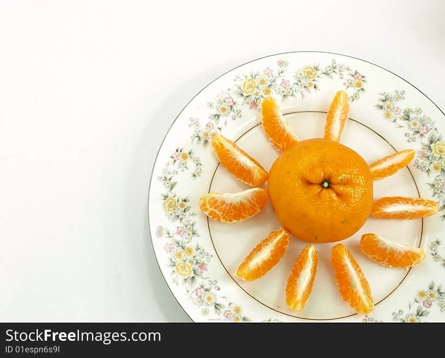 Tangerine placed on the desktop of the intraday