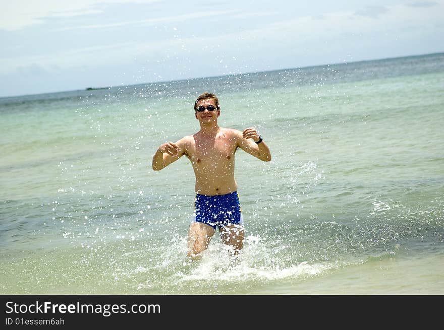 Male Model Playing With Water