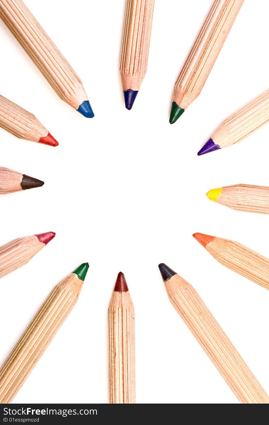 Colored pencils isolated over a white background