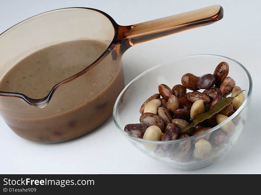 Brown beans soup with macaroni on plate