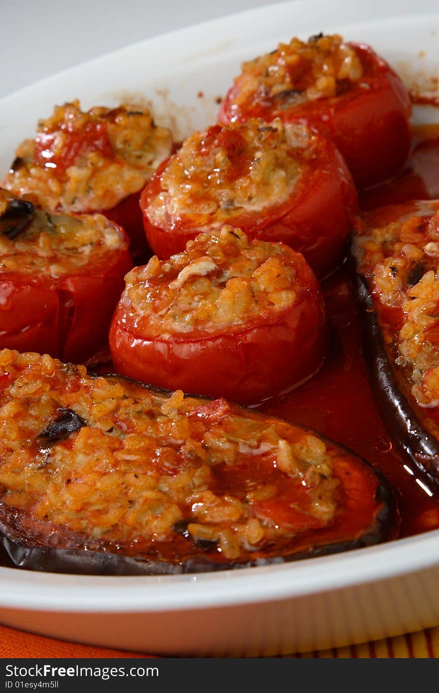 Eggplant and tomatoes filled with rice