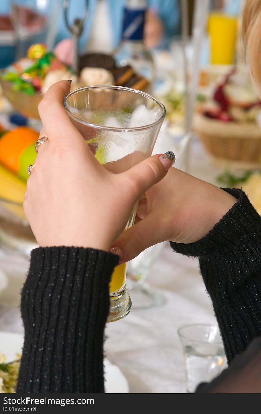 Glass In Female Hands.