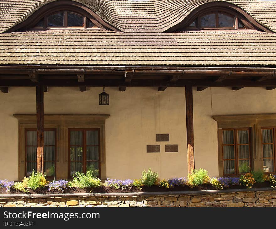 Old house and flowers in south Poland - Beskidy.