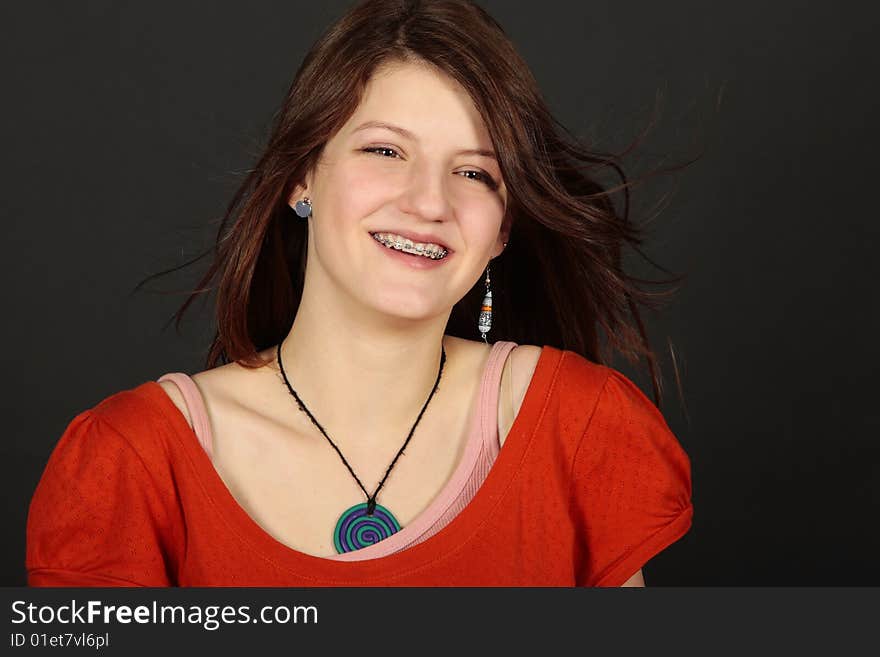 Teenage Red Head Girl Smiling With Braceface