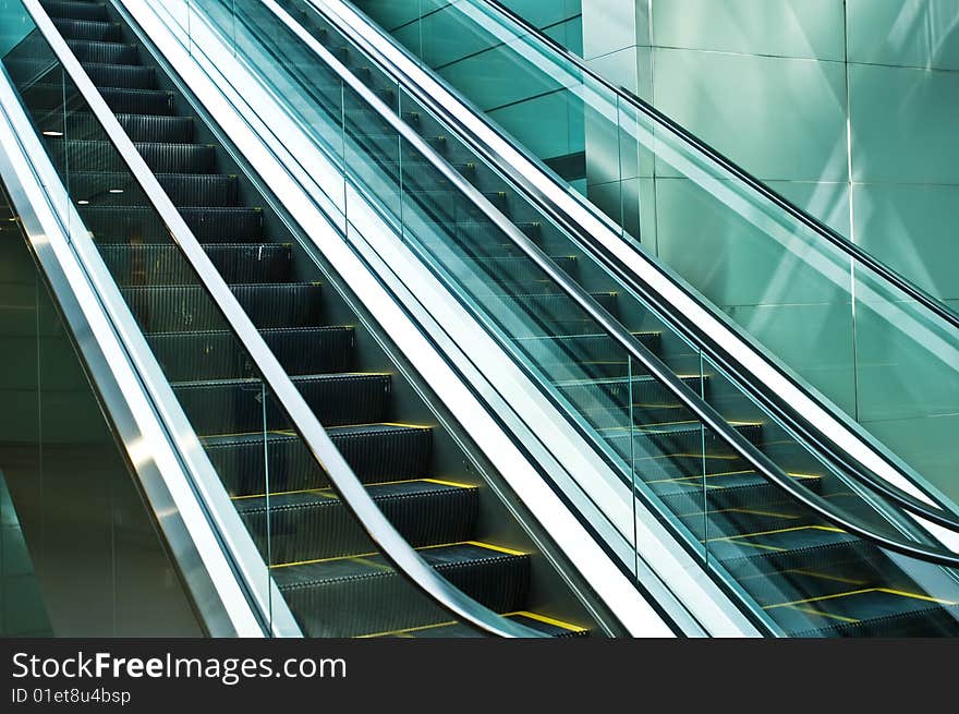 Escalators in modern hall of beijing airfield.