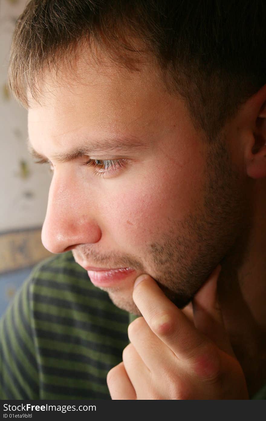 Young man portrait, thinking