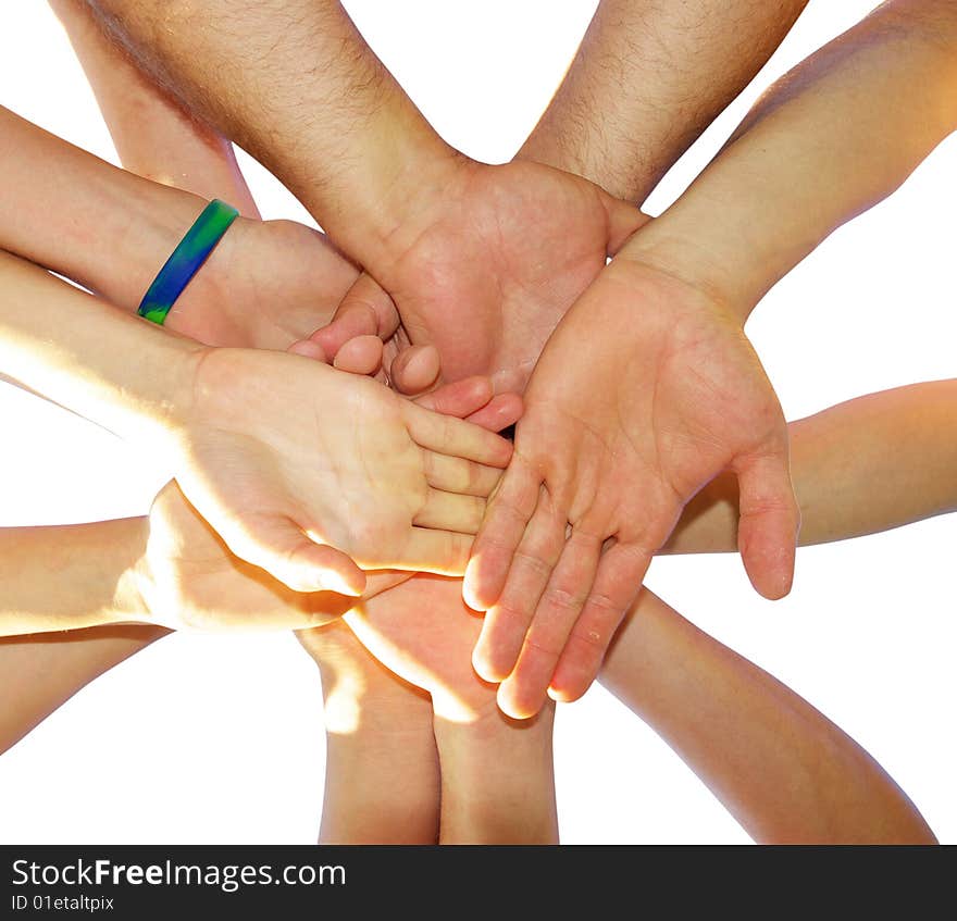 Pile of hands isolated on white