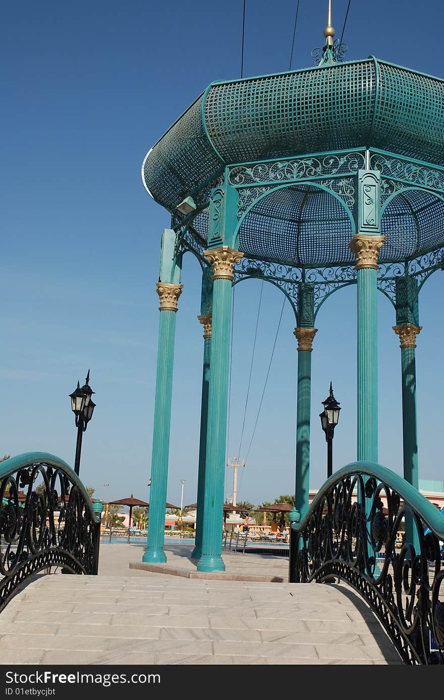 Blue arbour after a bridge