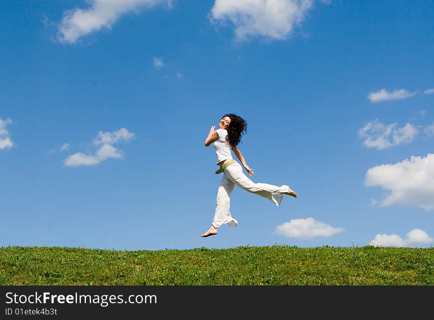 Happy woman is jumping