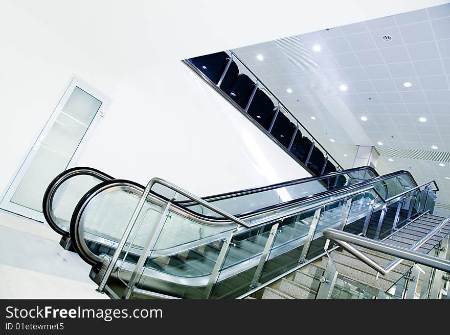 Escalator and stairs going up. Escalator and stairs going up