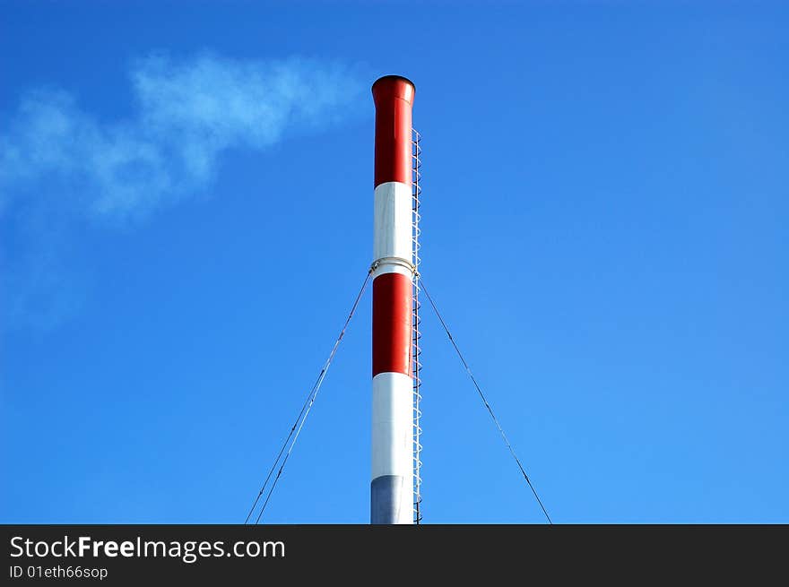 Chimney isolated on blue sky. Chimney isolated on blue sky