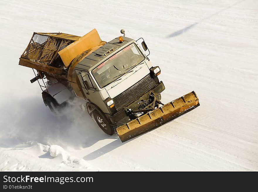 Snow buldoser on the road