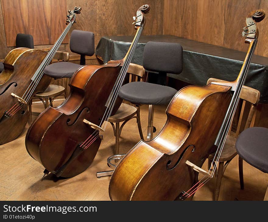 Three Contrabasses arranged in row