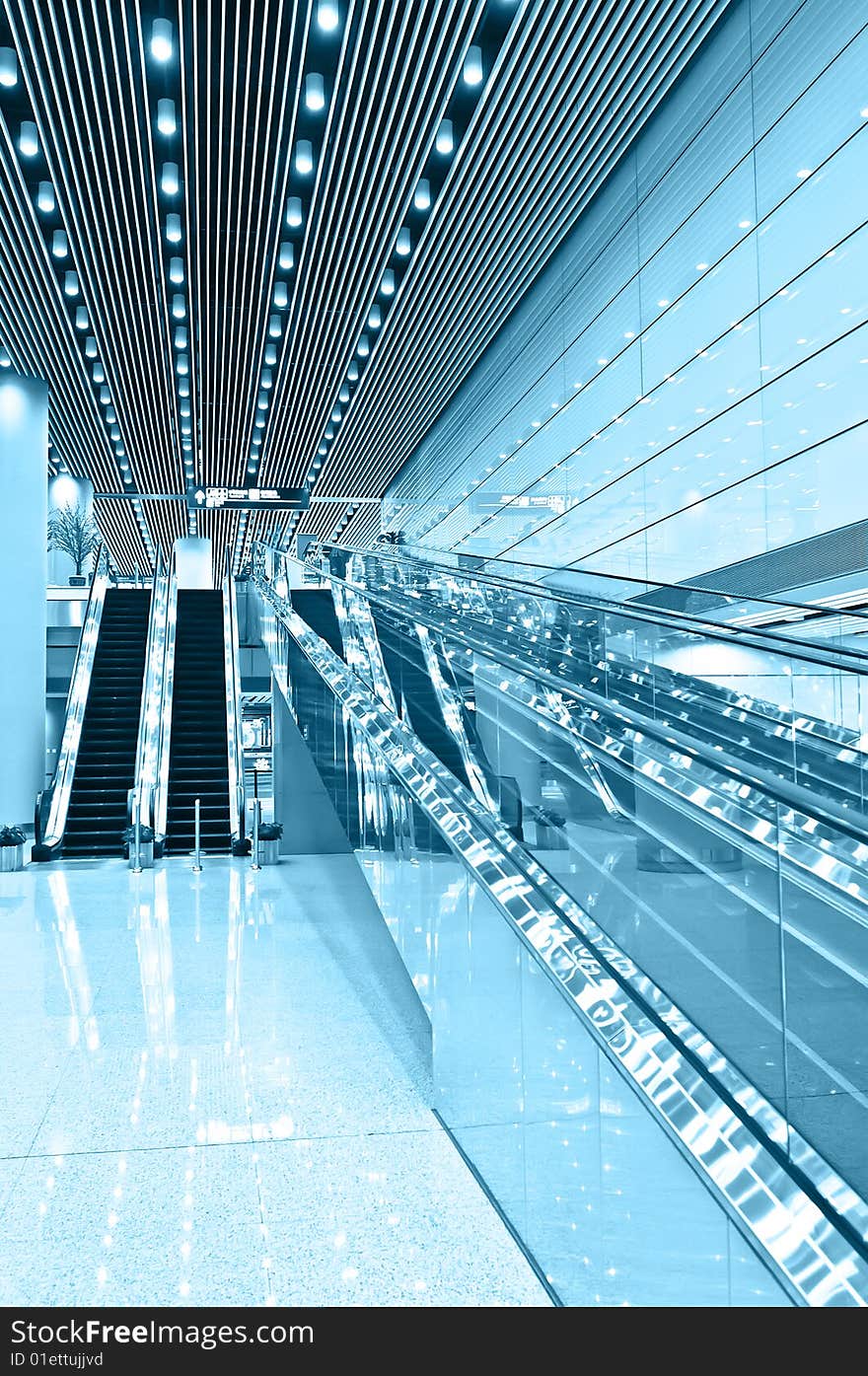 Escalators in modern hall of T3 airfield beijing.